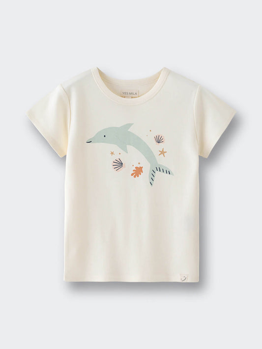 Cream colored children's t-shirt with dolphin and seashell graphic design Feature Print Short Sleeve Tee - Dolphin Short Sleeve Tee Shirt - Dolphin Girls