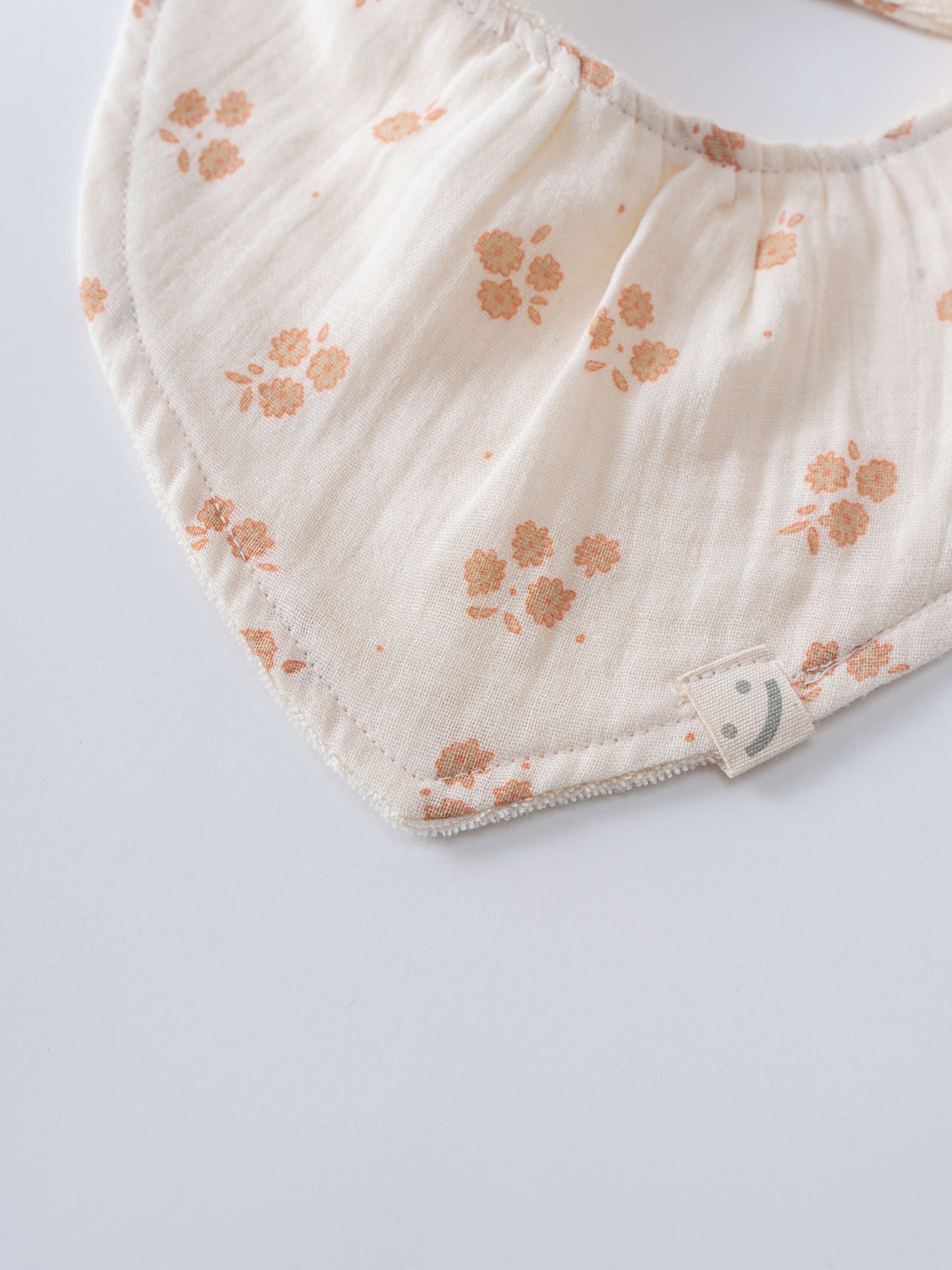 Fabric with floral pattern on a plain background Bandana Bibs 3 Pack - Petal Paws Baby girl