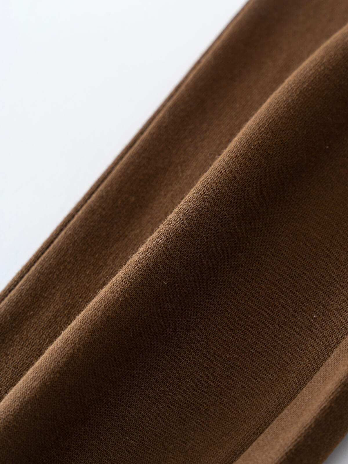 Close-up of brown fabric showing texture and folds in detail Cargo Sweatpants - Spruce Boys