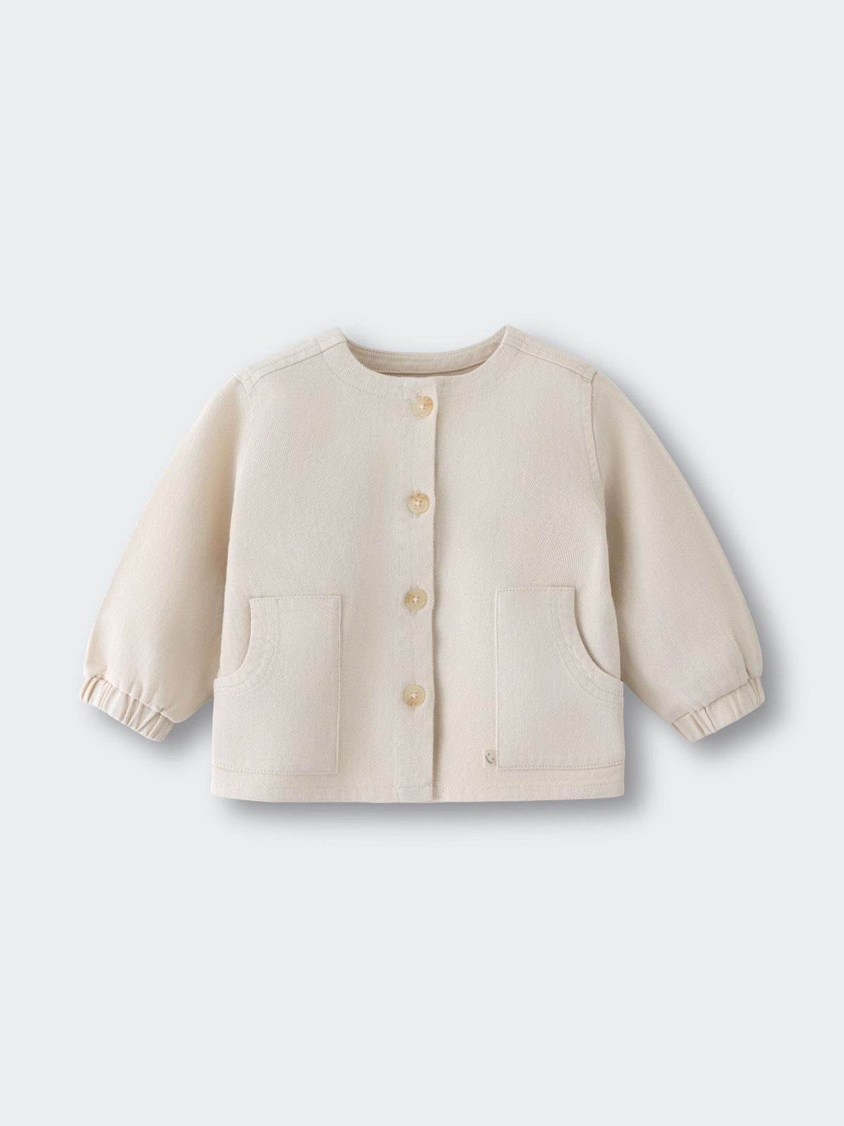 Cream-colored baby jacket with buttons and patch pockets on white background Charlotte Jacket - Salt Baby girl