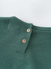 Close-up of green fabric with two buttons near the neckline Baby Long Sleeve Jersey Dress - Meadow Friends Baby girl