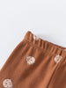 Close-up of rust-colored baby leggings with embroidered bear faces Baby Printed Leggings - Cosy Bear Russet Baby boy