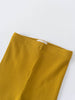 Close-up of mustard yellow ribbed fabric leggings with elastic waistband and white tag Baby Ribbed Leggings - Golden Pear Baby boy