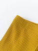 Close-up of mustard yellow ribbed fabric texture on white background Baby Ribbed Leggings - Golden Pear Baby boy
