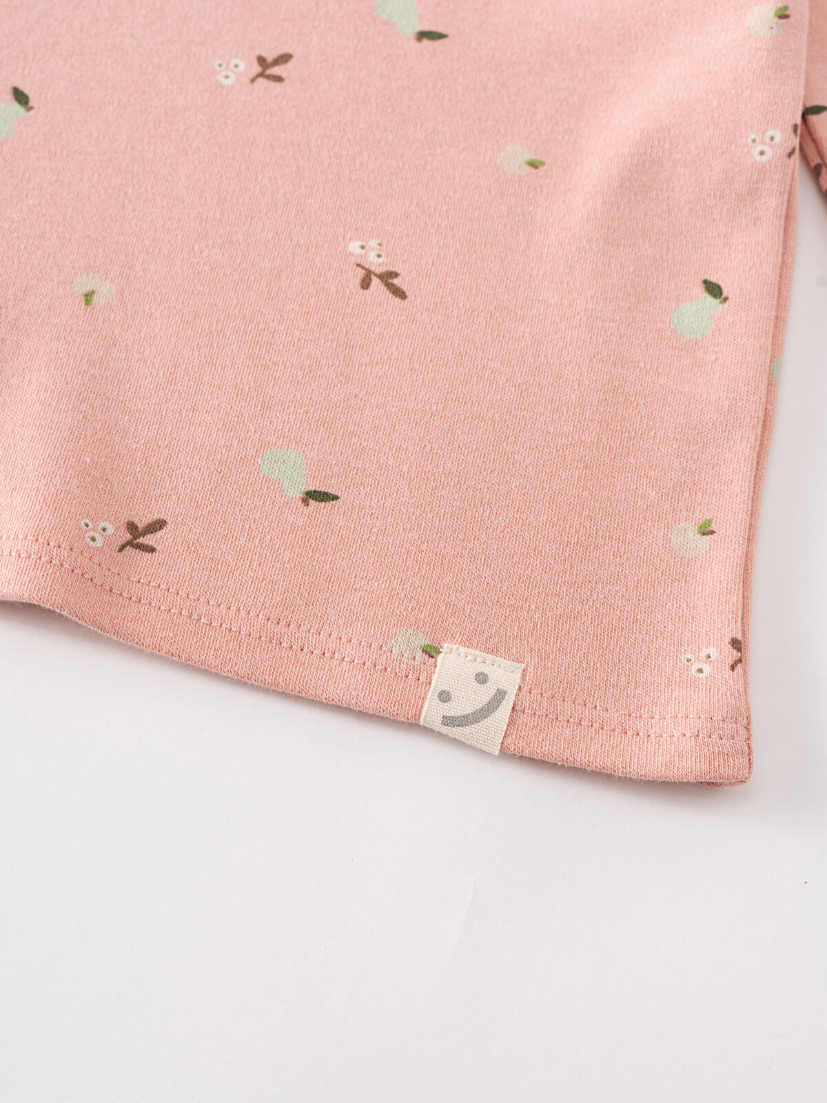 Pink baby sweater with small patterns on a light gray background Baby Printed Long Sleeve Tee - Autumn Harvest Rosehip Baby girl
