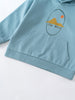 Close-up of light blue hoodie with mountain graphic and front pocket Feature Print Hoodie - Stay Wild Boys