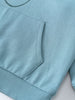 Close-up of a light blue hoodie pocket and ribbed hem detail Feature Print Hoodie - Stay Wild Boys