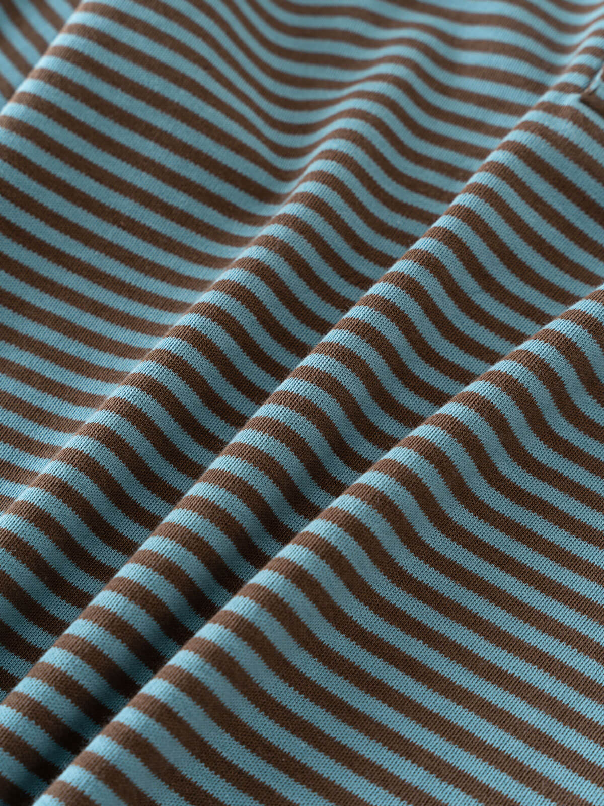 Close-up of brown and blue striped fabric with visible texture and folds Henley Long Sleeve Tee - Lake Boys