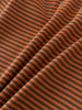 Close-up of orange and brown striped fabric with soft folds Henley Long Sleeve Tee - Pumpkin Boys