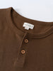 Close-up of a brown henley shirt neckline with two buttons Henley Short Sleeve Tee - Spruce Boys