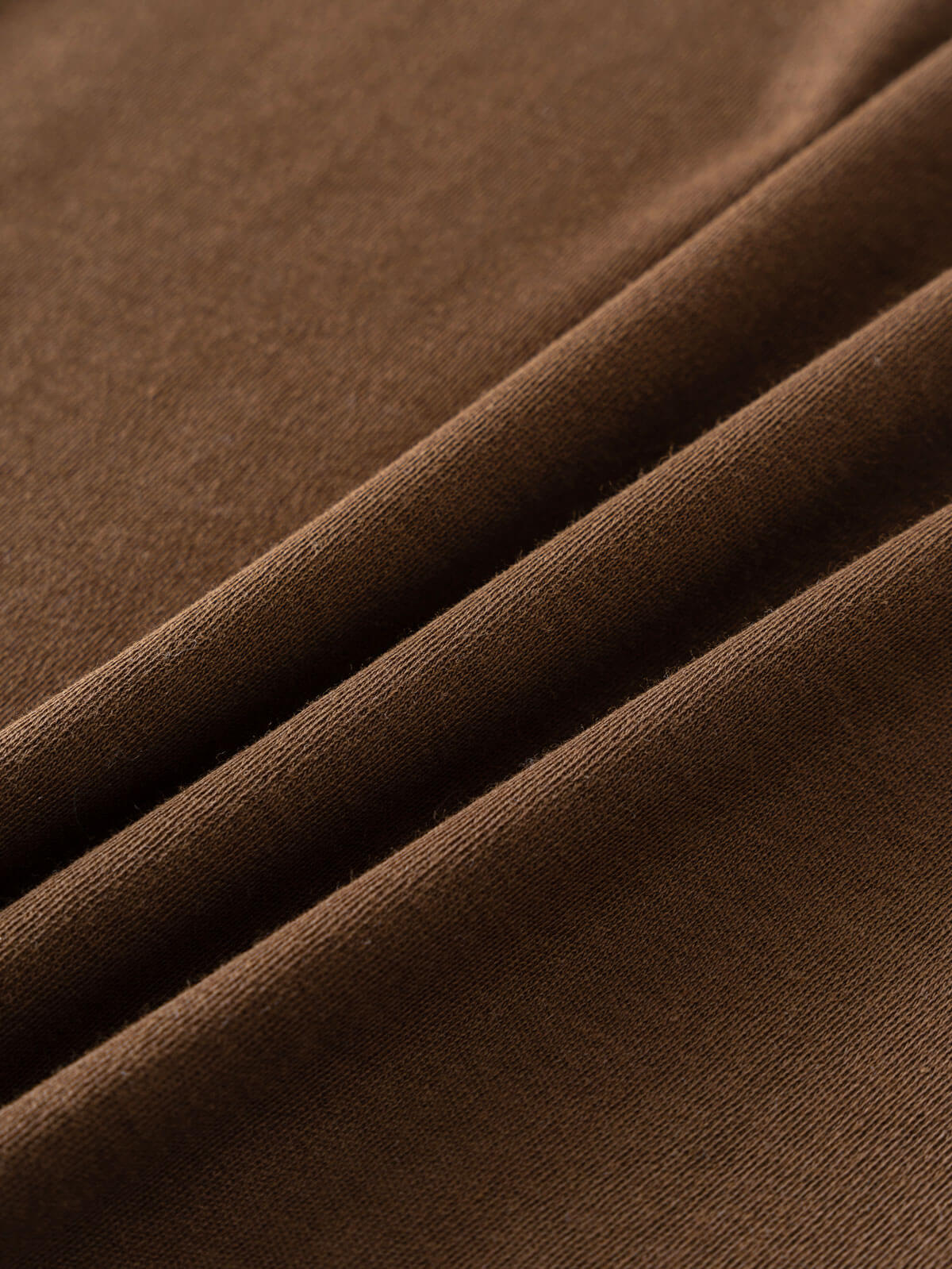 Close-up of brown ribbed fabric with soft folds and texture Henley Short Sleeve Tee - Spruce Boys