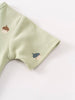 Close-up of sage green fabric sleeve with small acorn embroidery detail Henley Short Sleeve Bodysuit - Little Acorn Sage Baby boy