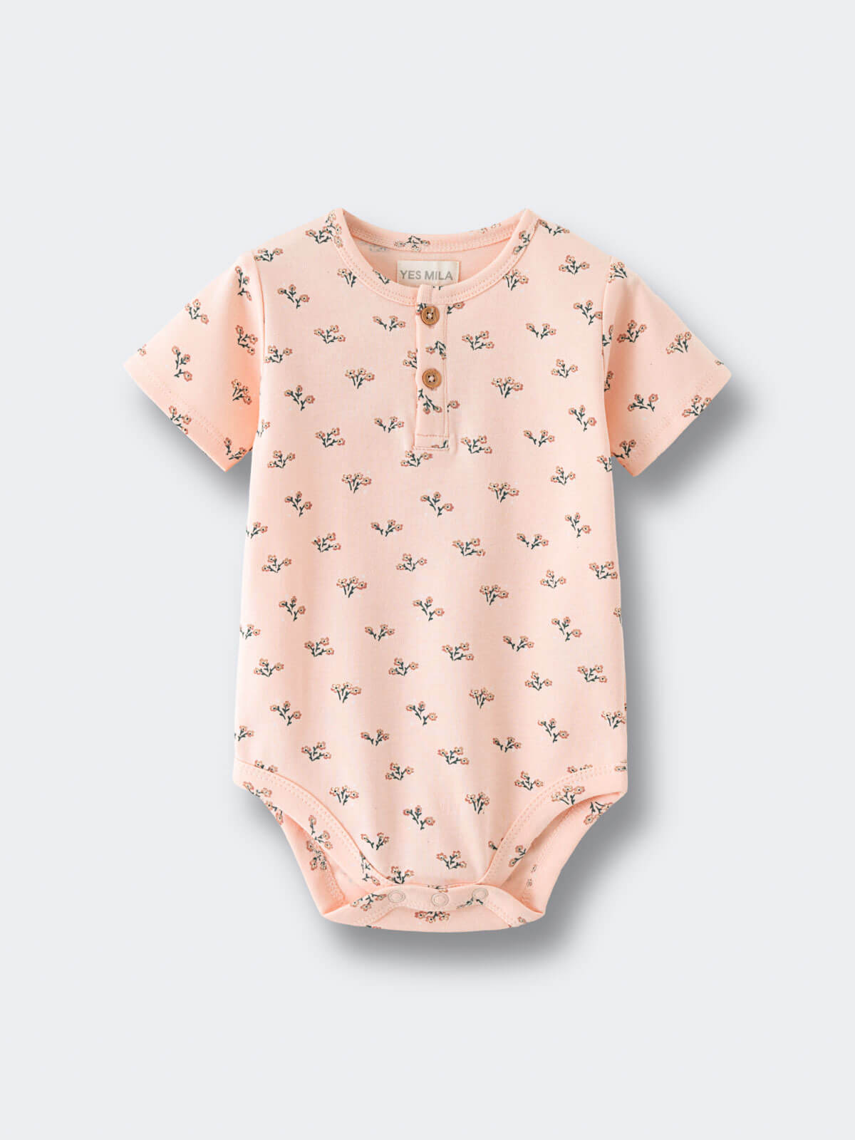Peach bodysuit with small floral print and button front detail Henley Short Sleeve Bodysuit - Wildflower Bouquet Pink Baby girl