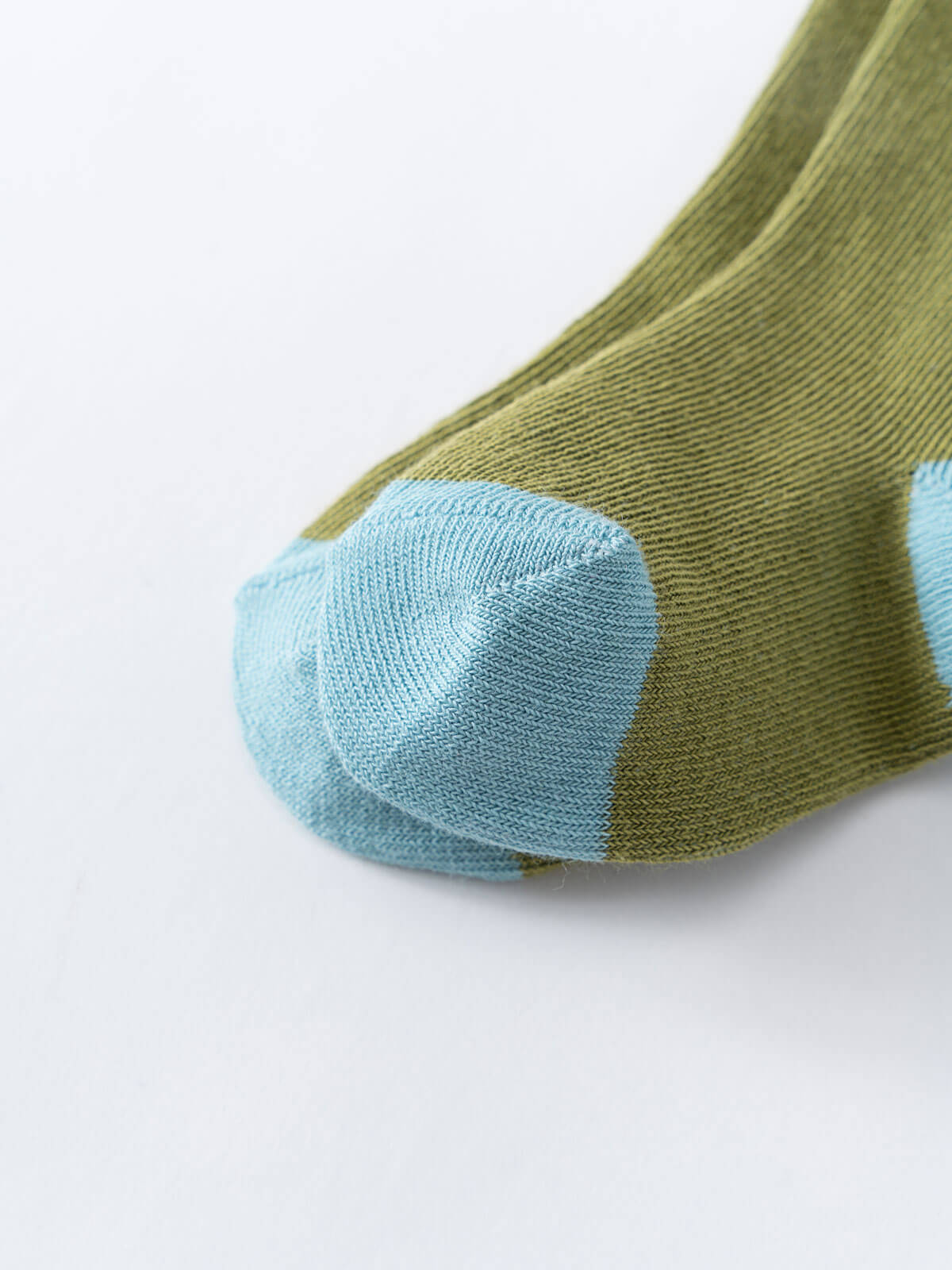 Close-up of olive green sock with light blue heel and toe section Kids Socks 3 Pack - Acorn Boys