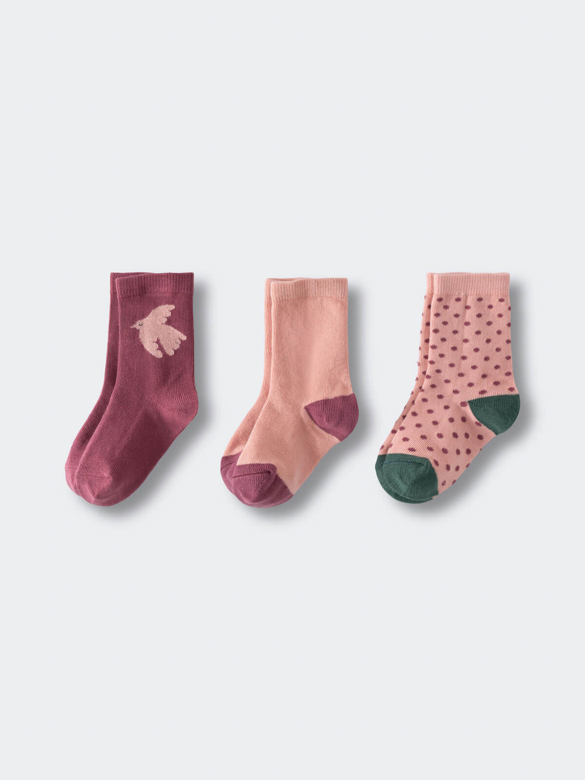 Three pairs of children's socks in pink and burgundy tones with different patterns Kids Socks 3 Pack - Dove Girls