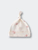 Cream-colored baby hat with pink animal print and knotted top Knot Hat - Meadow Friends Ecru Baby girl