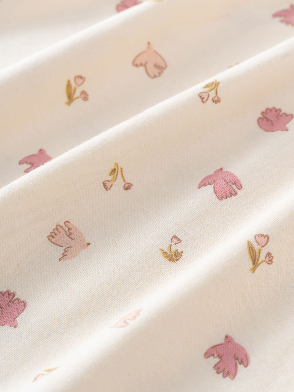 Close-up of cream fabric with pink flowers and gold leaf embroidery Long Sleeve Jersey Dress - Bird And Blossom Ecru Girls