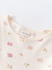 Close-up of cream jersey fabric with pink bird and blossom print Long Sleeve Jersey Dress - Bird And Blossom Ecru Girls