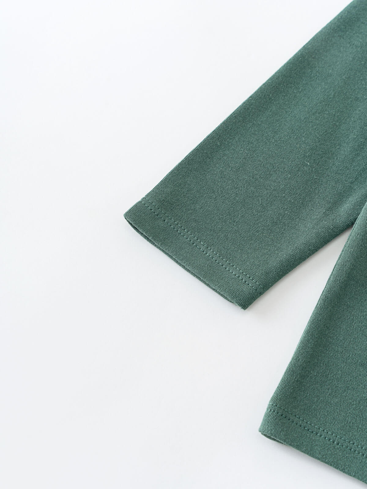 Close-up of sage green ribbed fabric long sleeve cuffs with stitching Long Sleeve Tee - Balsam Boys
