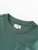 Close-up of a green long sleeve tee collar with white label Long Sleeve Tee - Balsam Boys