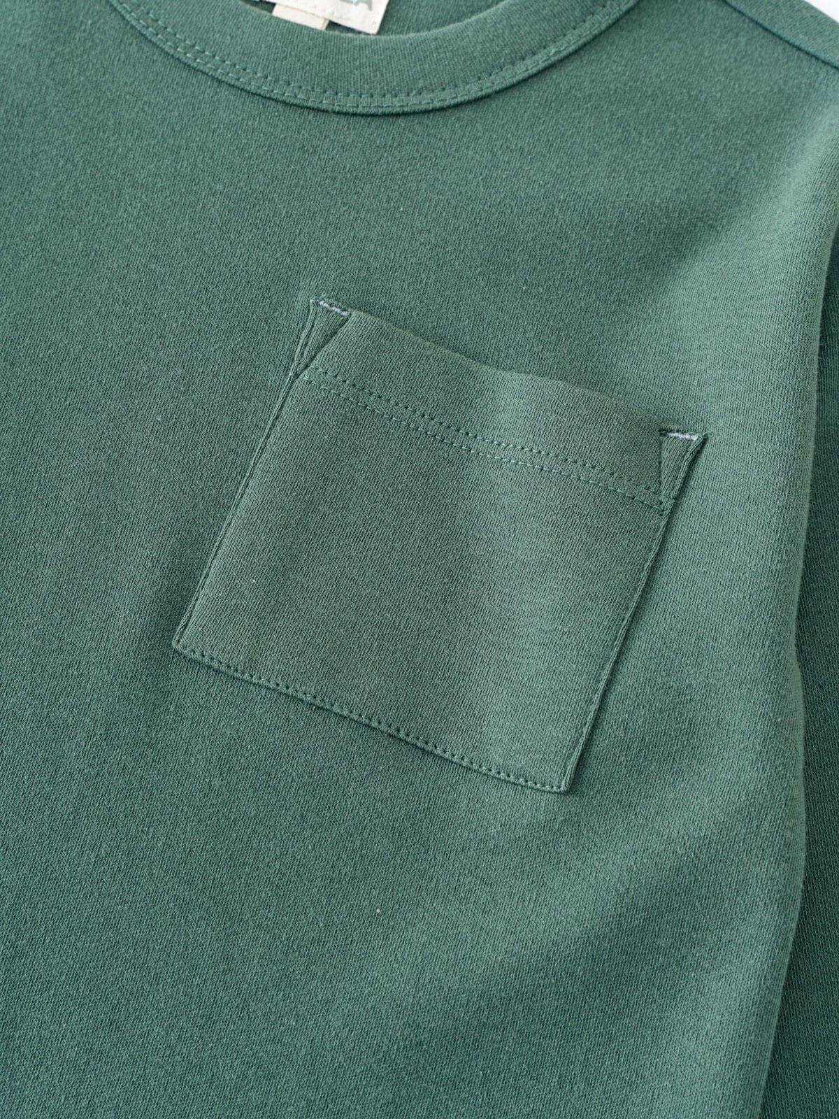 Close-up of a teal long sleeve shirt with chest pocket Long Sleeve Tee - Balsam Boys