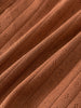 Close-up of rust-colored knitted fabric with eyelet detail and ribbed texture Pointelle Crossover Bodysuit - Russet Baby boy