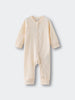 Beige baby onesie on a light gray background Pointelle Long Sleeve One Piece - Ecru Baby boy