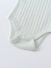 Close-up of a pale green ribbed knit bodysuit with snap buttons Pointelle Singlet Bodysuit - Sea Foam Baby boy