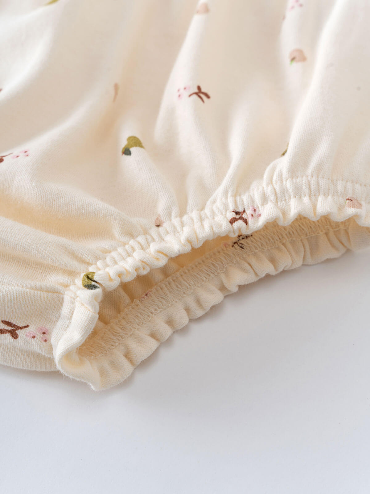 Close-up of cream fabric with small floral embroidery and gathered elastic edge Printed Bloomers - Autumn Harvest Ecru Baby girl