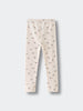 Light colored leggings with small floral print pattern laid flat Printed Leggings - Wild Meadow Ecru Girls