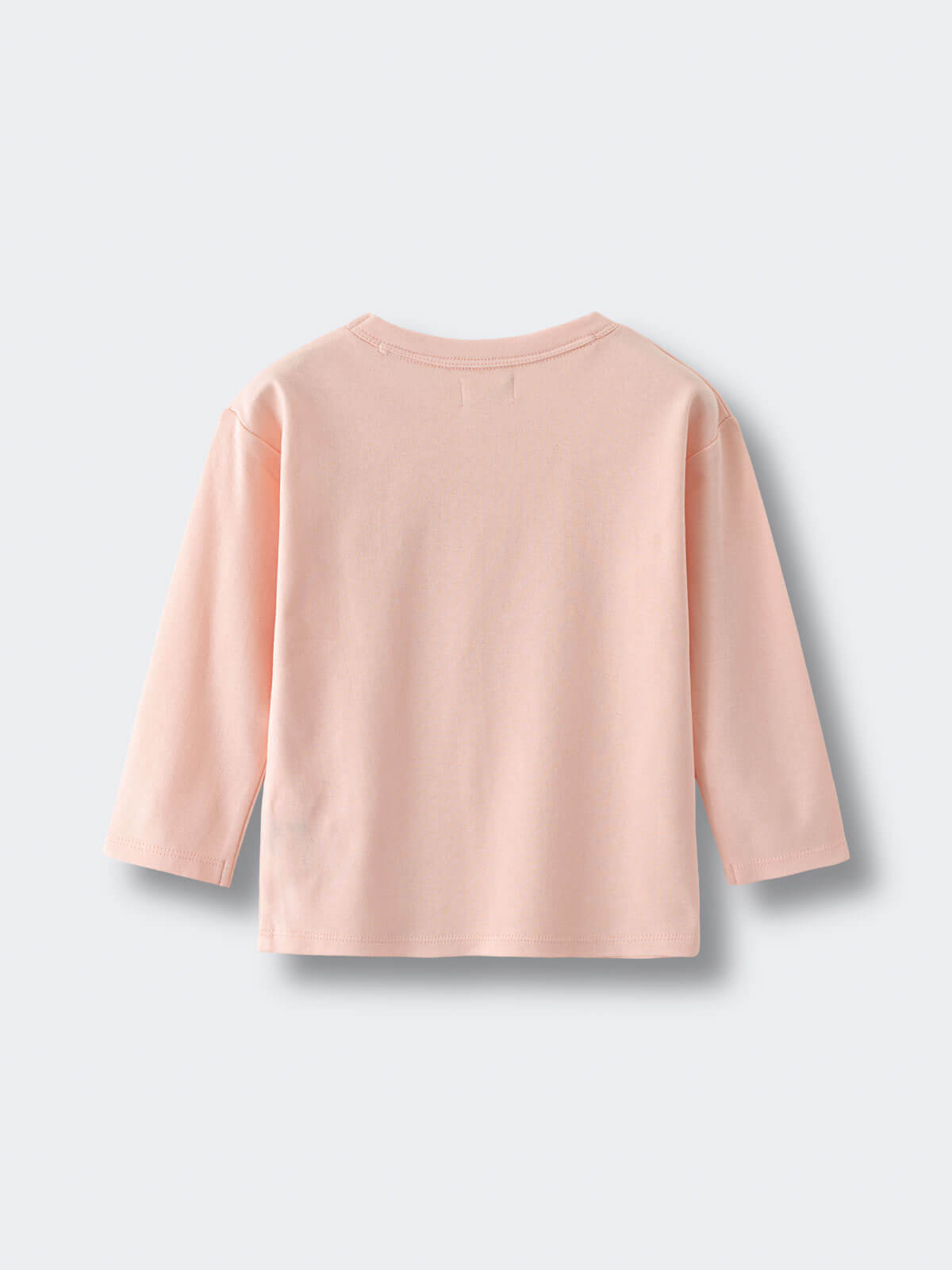 Back view of a pale pink long sleeve shirt laid flat Printed Long Sleeve Tee - Dove Girls