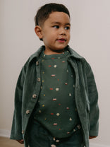 Young boy wearing a green patterned shirt and corduroy jacket against white background Printed Long Sleeve Tee - Mountain View Balsam Boys