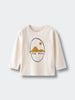 Cream long sleeve shirt with illustrated mountain and sun graphic reading "STAY WILD Printed Long Sleeve Tee - Stay Wild Boys