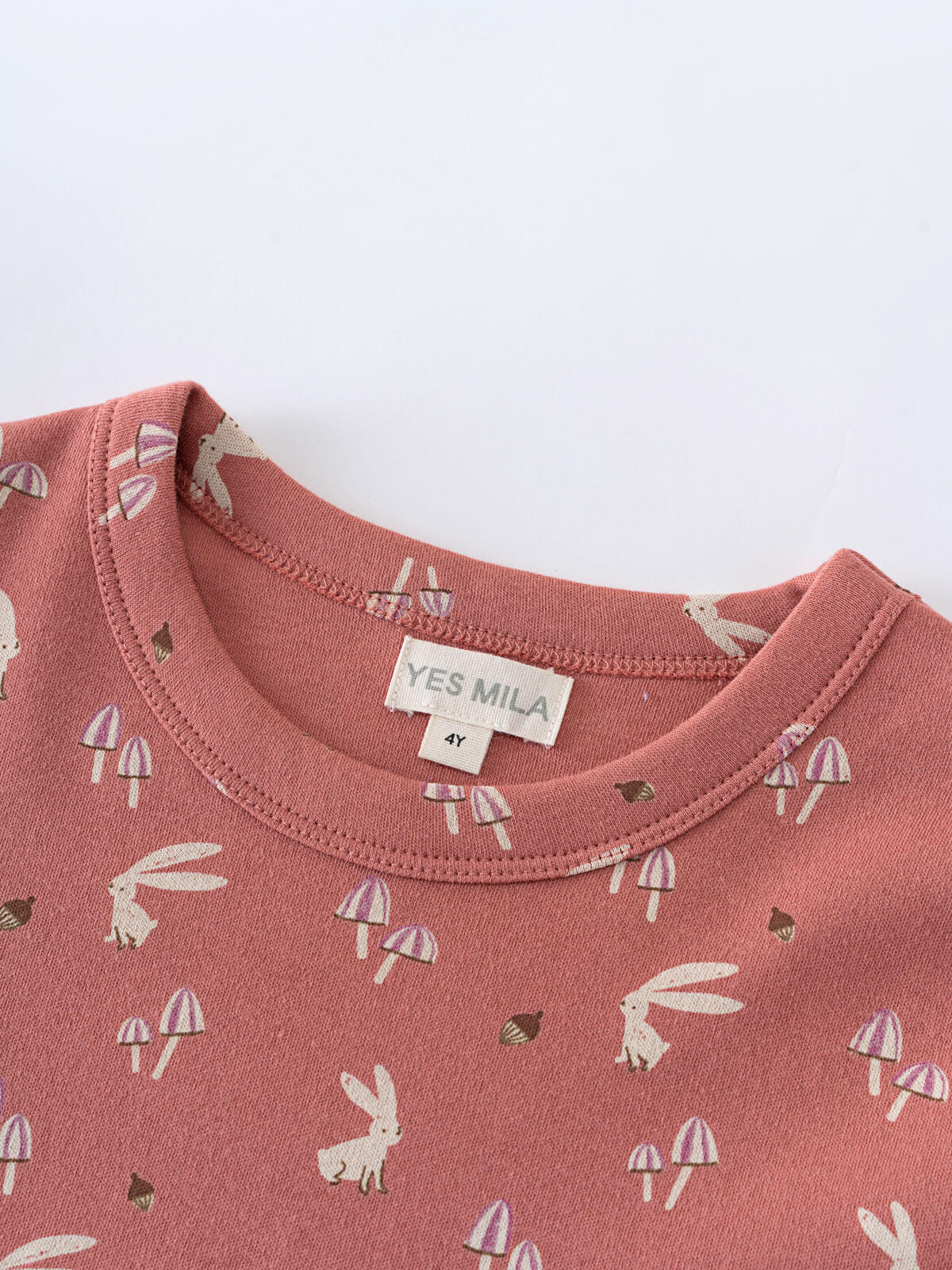 Close-up of a pink tee with mushroom and bunny print pattern Printed Short Sleeve Tee - Forest Gathering Rosehip Girls