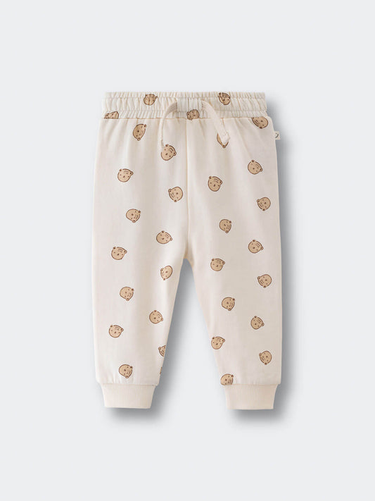 Cream-colored baby sweatpants with brown bear face print pattern Printed Sweatpants - Cosy Bear Ecru Baby boy