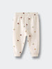 Cream-colored baby sweatpants with small acorn print pattern and ribbed cuffs Printed Sweatpants - Little Acorn Ecru Baby girl