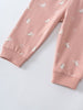 Close-up of pink sweatpants with white bunny and flower print pattern Printed Sweatpants - Meadow Friends Blush Baby girl