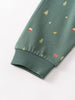 Close-up of green fabric cuff with small embroidered trees and nature motifs Printed Sweatpants - Mountain View Balsam Baby boy