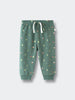 Green sweatpants with forest pattern and white drawstring on flat surface Printed Sweatpants - Mountain View Balsam Baby boy