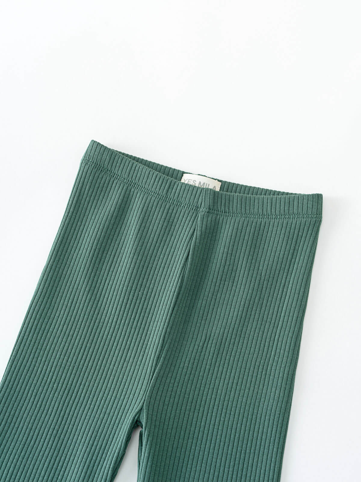 Close-up of ribbed green leggings showing waistband and textured fabric detail Ribbed Leggings - Balsam Girls
