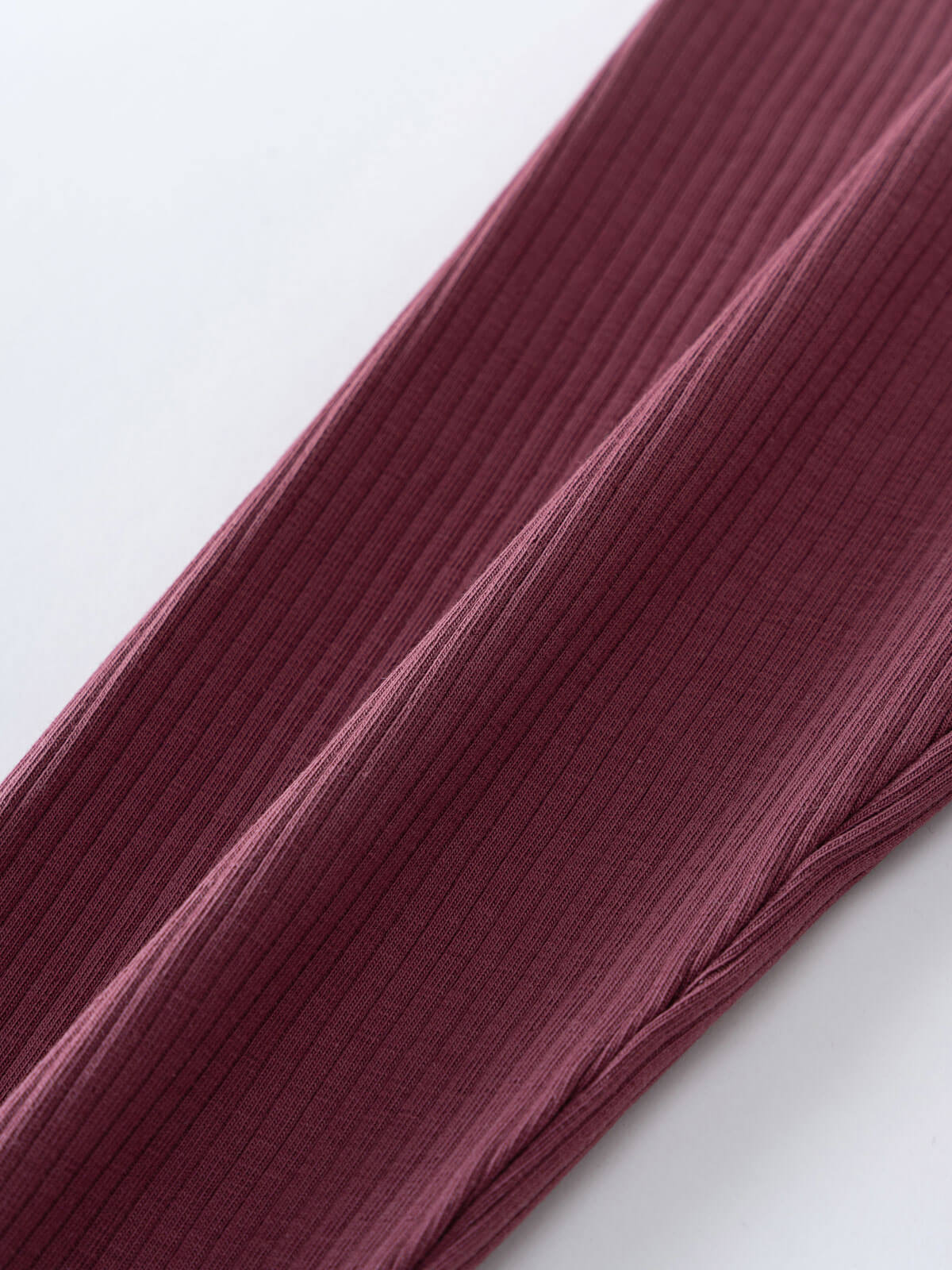 Close-up of burgundy ribbed fabric texture with vertical lines Ribbed Leggings - Plum Jam Girls