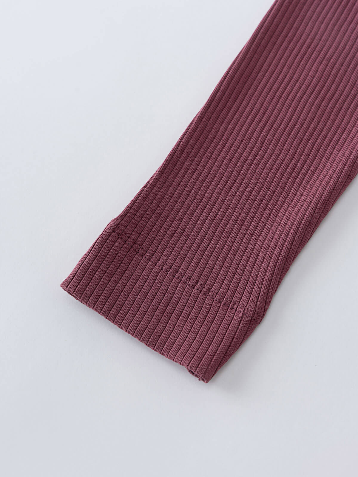 Close-up of ribbed fabric legging leg in dusty plum color Ribbed Leggings - Plum Jam Girls