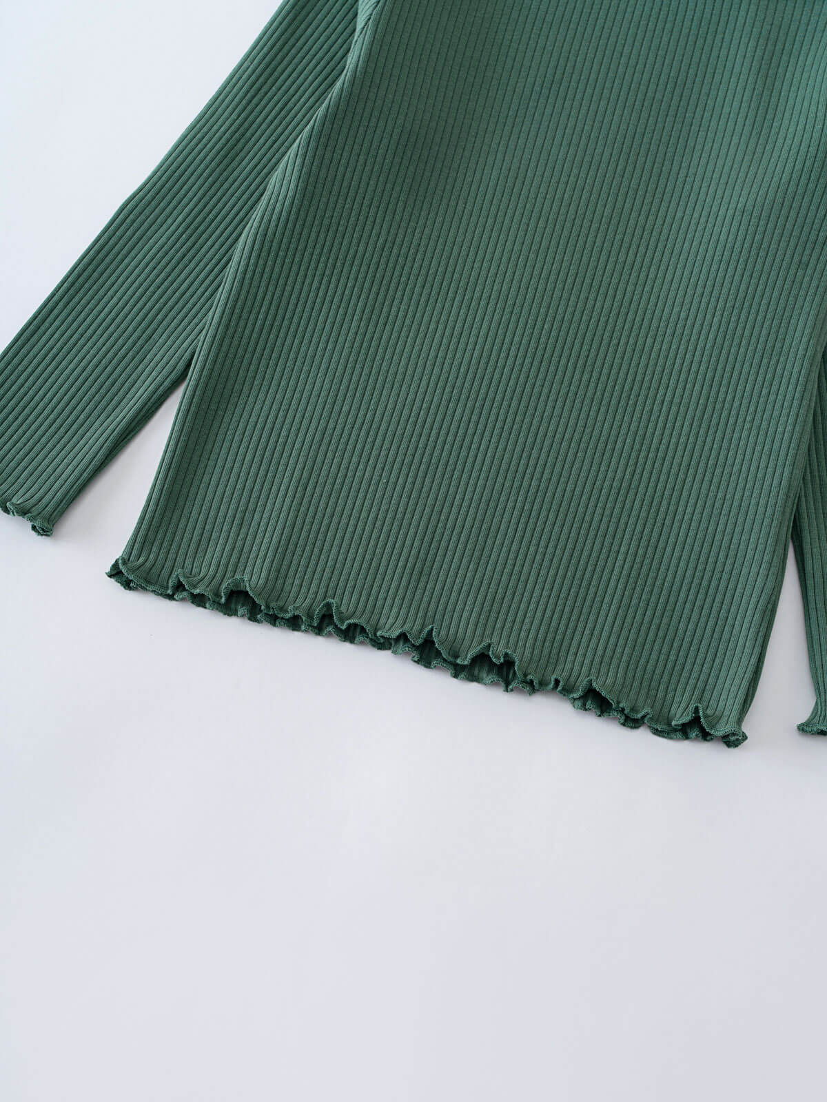 Green ribbed long sleeve shirt with ruffled trim on white background Ribbed Long Sleeve Tee - Balsam Girls