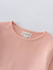Close-up of a pink ribbed long sleeve shirt collar with label Ribbed Long Sleeve Tee - Mallow Girls
