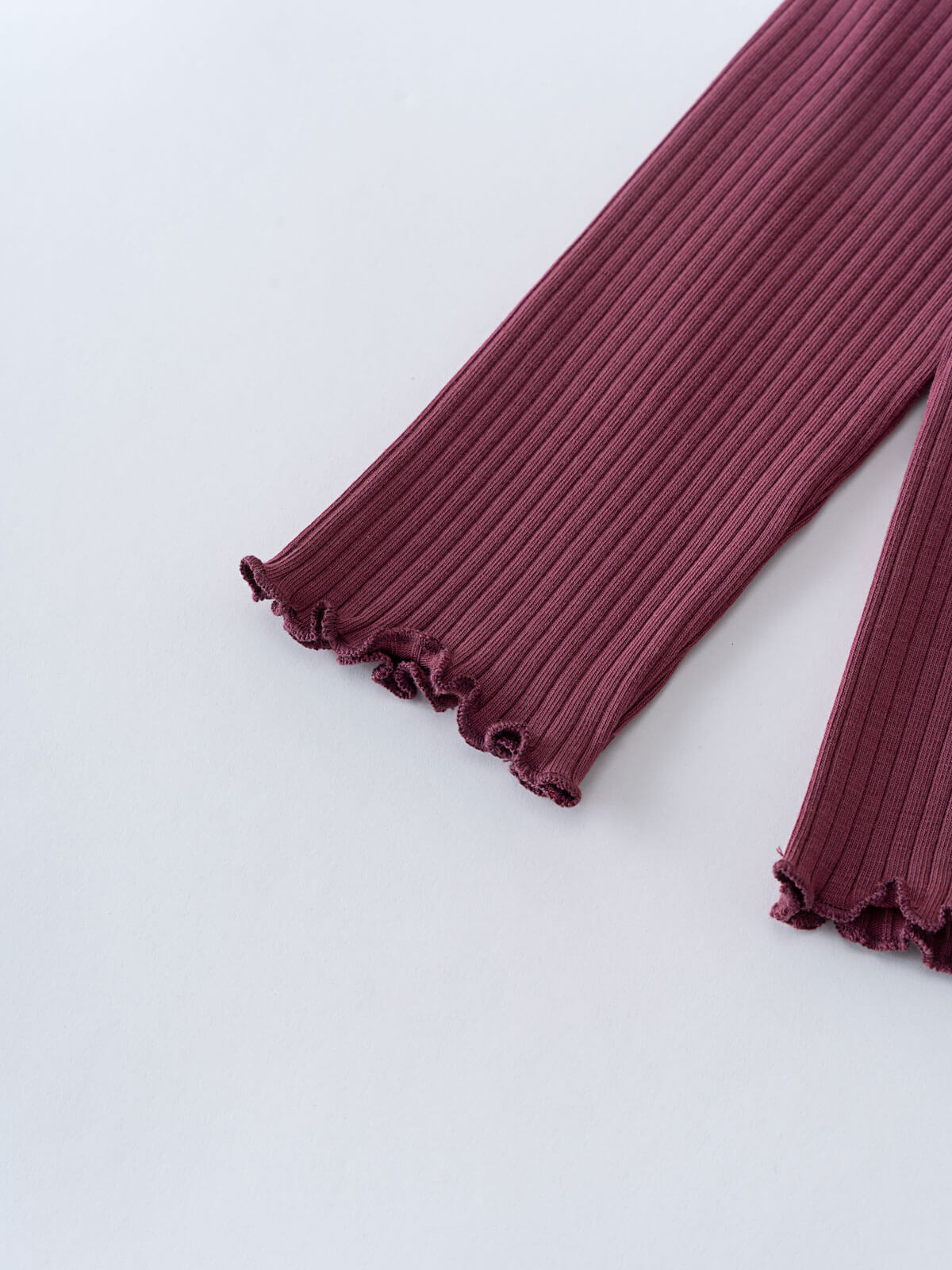 Close-up of burgundy ribbed fabric sleeves with ruffled cuffs Ribbed Long Sleeve Tee - Plum Jam Girls