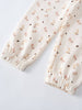 Close-up of cream fabric with small bunny and mushroom print pattern Sweatpants - Forest Gathering Ecru Girls