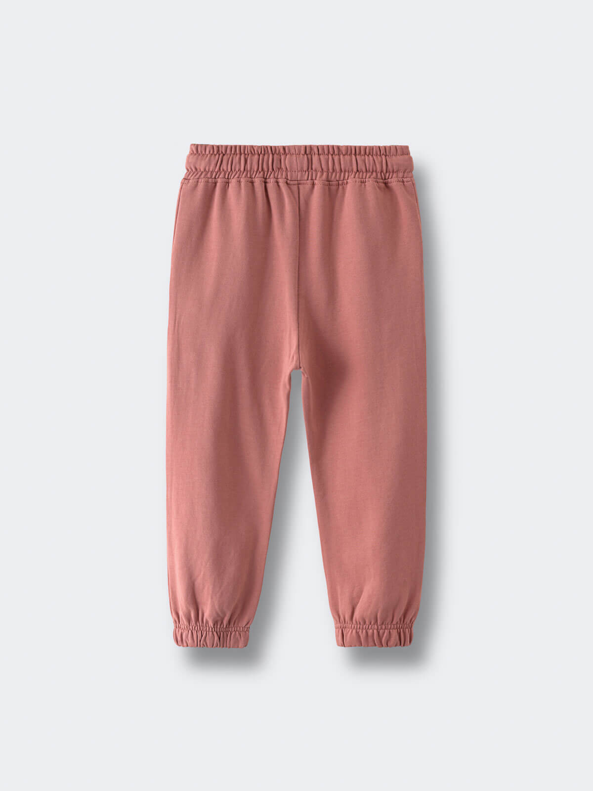 Pink sweatpants on a light gray background Sweatpants - Rosehip Girls