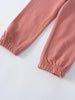 Pink pants on a light gray background Sweatpants - Rosehip Girls