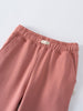 Pink sweatpants with a brand label on a white background Sweatpants - Rosehip Girls