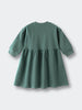 Green sweatshirt dress with gathered skirt and ribbed cuffs laid flat Sweatshirt Dress - Dove Girls